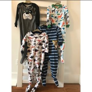 Toddler, size 2T Carter’s footed pajamas. 4-pack